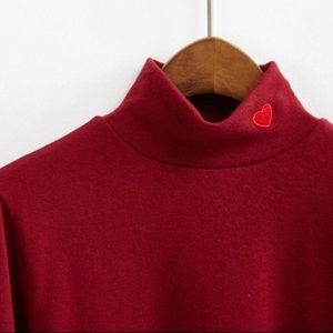 Maroon turtleneck sweater heart embroidery